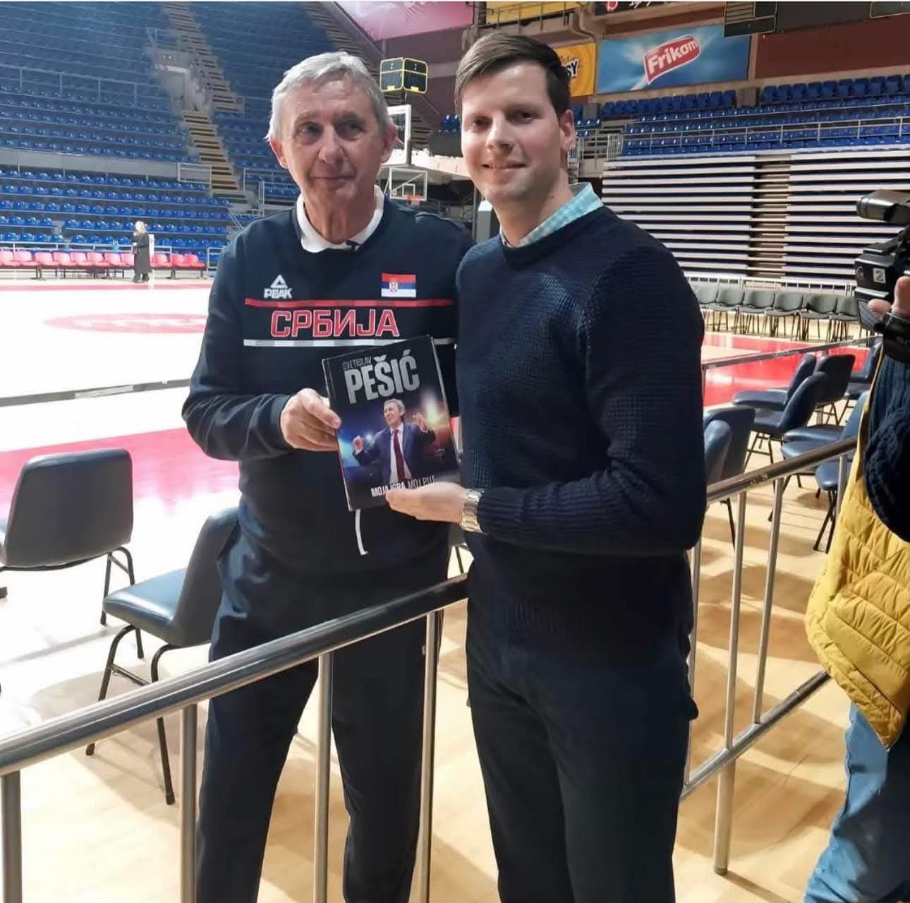 Coach Stefan with basketball professional