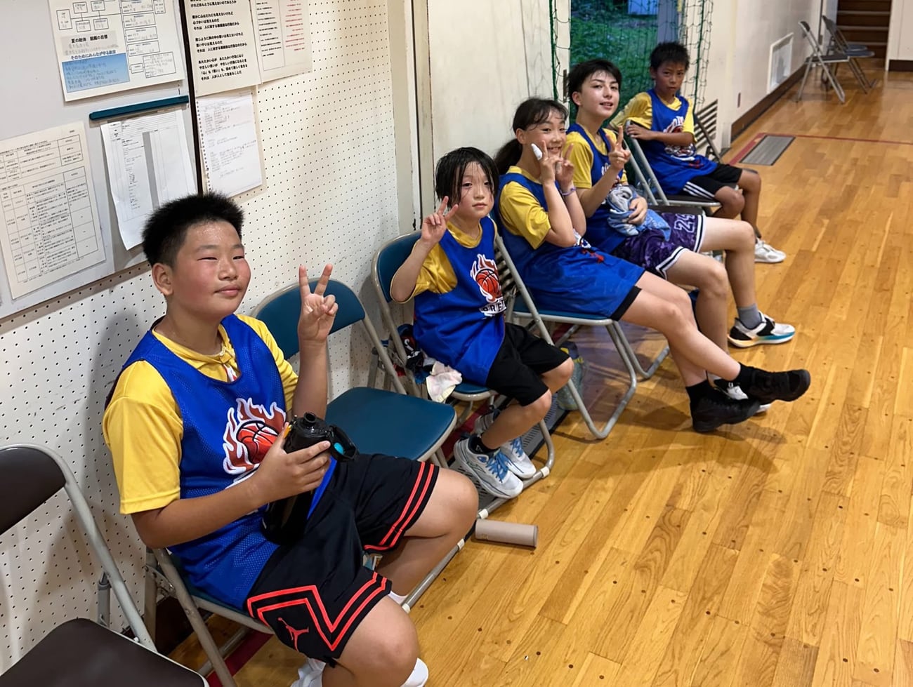 Dream Star players sitting together after training